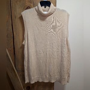 A Diane Von Furstenberg 100% Silk sleeveless mock turtleneck sweater. Size 1X